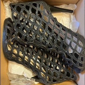 Size 9 Ebony rhinestone, mermaid tail webbed stilettos.